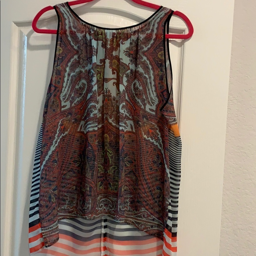 Bright colored sleeveless tunic top